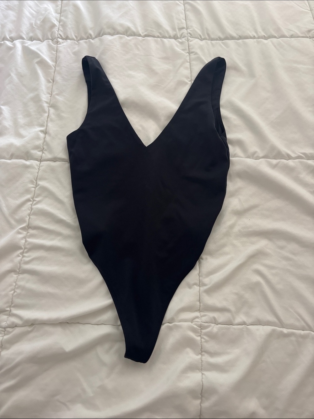Babaton Women’s Black V-Neck One-Piece Bodysuit